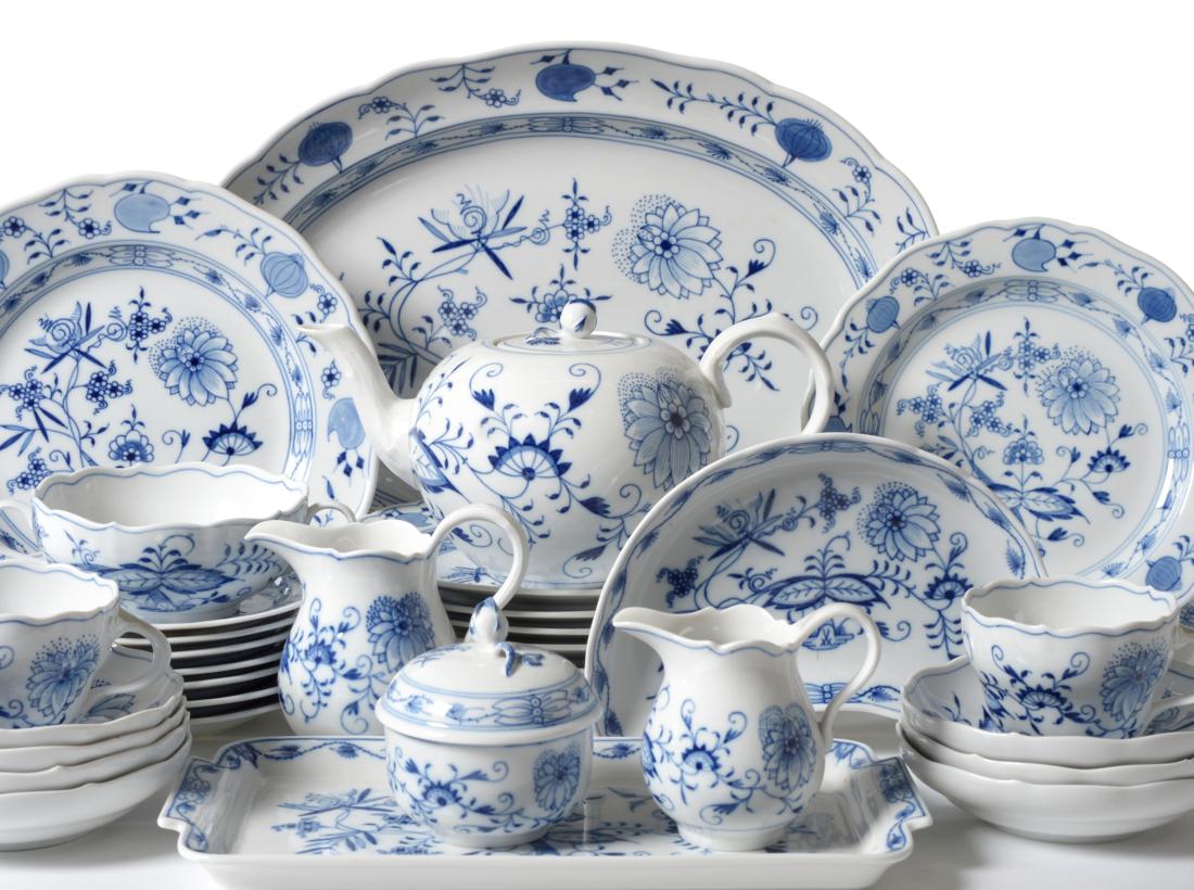 A Meissen Porcelain Onion Pattern Part Dinner Service, comprising seven écuelles and eight stands,