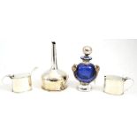 A silver mounted scent bottle, plated wine funnel and two silver salts