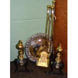 Three brass fire implements, a pair of brass and black painted fire dogs and two Spanish M.H.