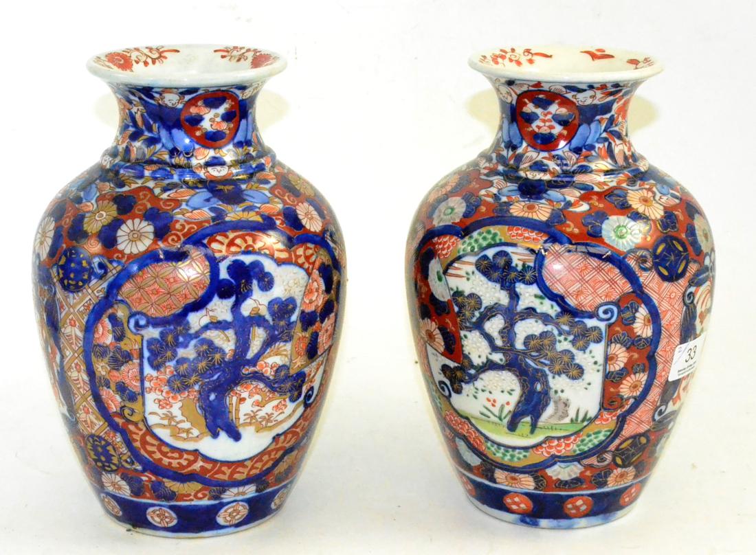 A near pair of Chinese 19th century Imari pattern vases