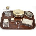 Silver and glass whisky tot, three silver topped jars, silver napkin ring, silver topped inkwell and