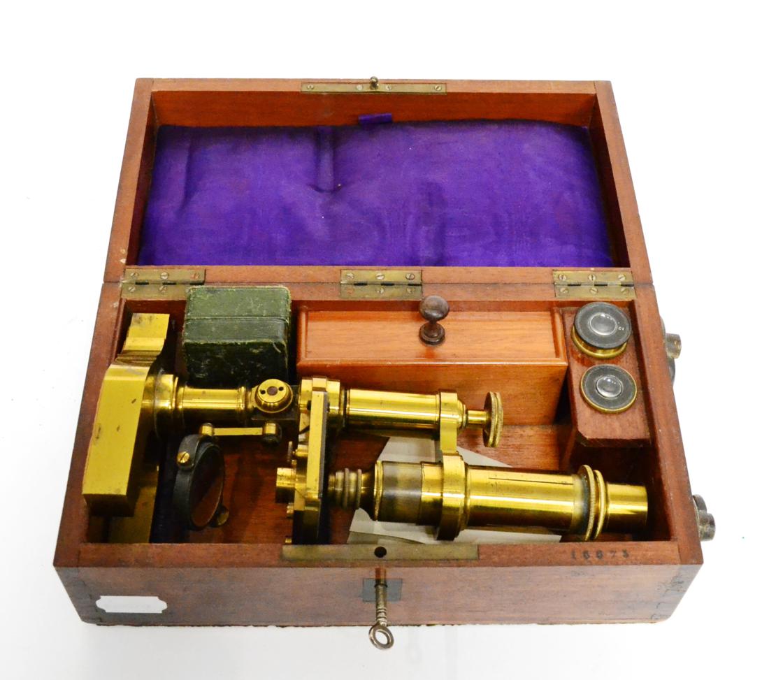 Hartnack & Prasmowski (Paris) Brass Microscope with draw tube focusing in mahogany case with