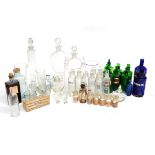 A Collection of Glass Chemists Bottles and Jars, including blue glass, green glass and clear
