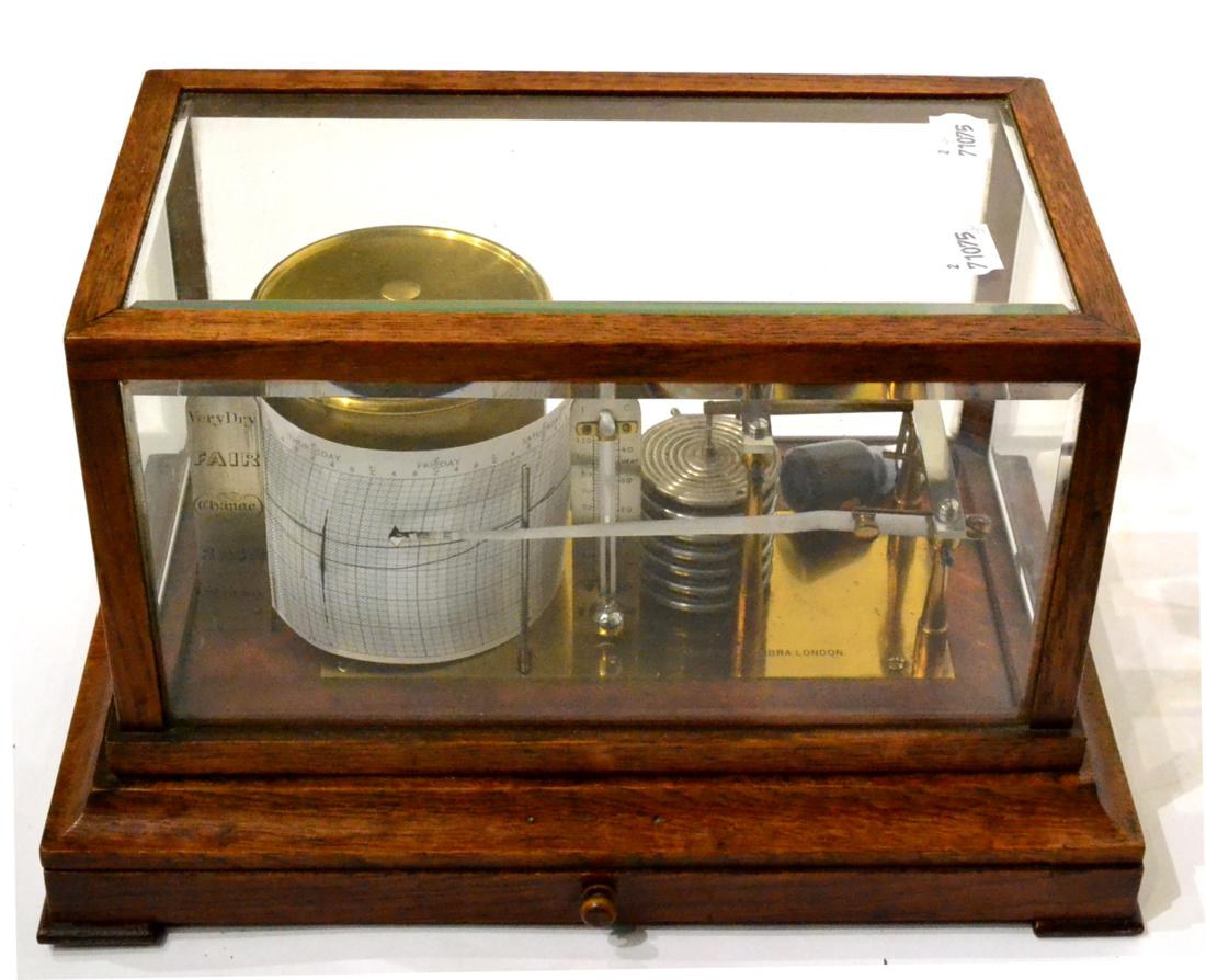 Negretti & Zambra Barograph with brass frame and base, seven segment vacuum, thermometer and upright