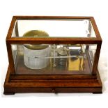 Negretti & Zambra Barograph with brass frame and base, seven segment vacuum, thermometer and upright