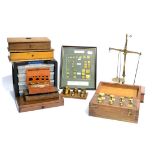 A Collection of Scales and Weights, including cased beam scales, cased set of cylindrical brass Troy