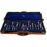 A Leather Cased Set of Military Ophthalmic Instruments by J. Weiss & Son, London, with lift out