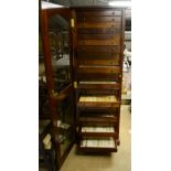 A Fine and Extensive Collection of British Moths, housed in a mahogany glazed 25 drawer standing