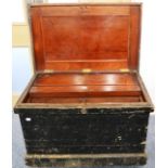 A Large Pine Tool Box, with iron strapping and fitted mahogany interior, raised on castors