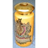 Large Glass Pharmacy Display Jar with gold crest and banner 'Rhubarb' on burn orange ground, with