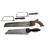 Four Steel Bone Saws, three with ebony handles, no makers names, one with walnut handle by Stoddart