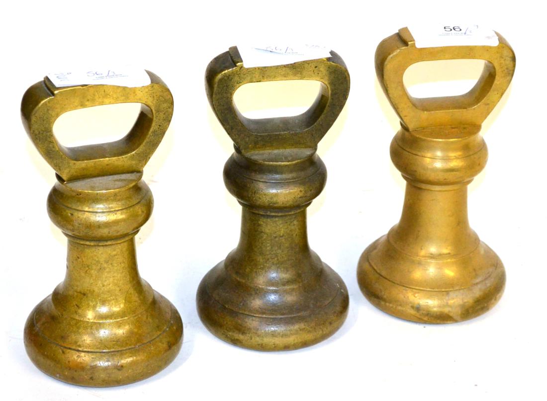 Three Avery 14lb Brass Bell Weights