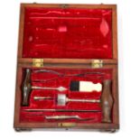 Victorian Trepanning Set with seven instruments including a circular saw and a scalpel marked '