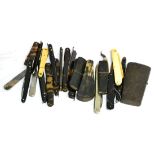 A Collection of Folding Lancets, Hooks and Knives, two cased, together with a steel lancet case