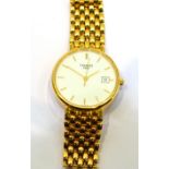 An 18ct Gold Centre Seconds Calendar Wristwatch, signed Tissot, circa 2011, quartz movement, white