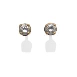 A Pair of 18 Carat Gold Diamond Solitaire Stud Earrings, the round brilliant cut diamonds in