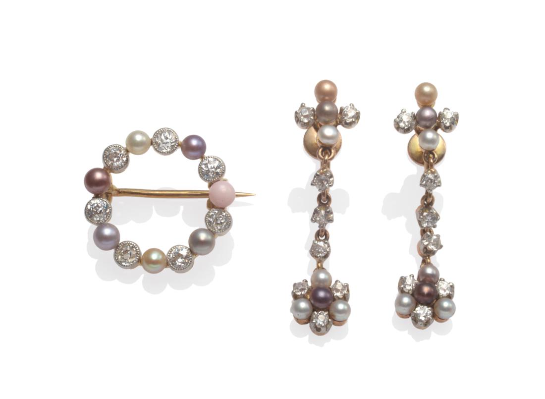 A Cultured Pearl and Diamond Hoop Brooch, the pearls in tones of purple and grey alternate with