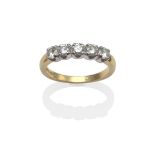 An 18 Carat Gold Diamond Five Stone Ring, the round brilliant cut diamonds in white claw settings,