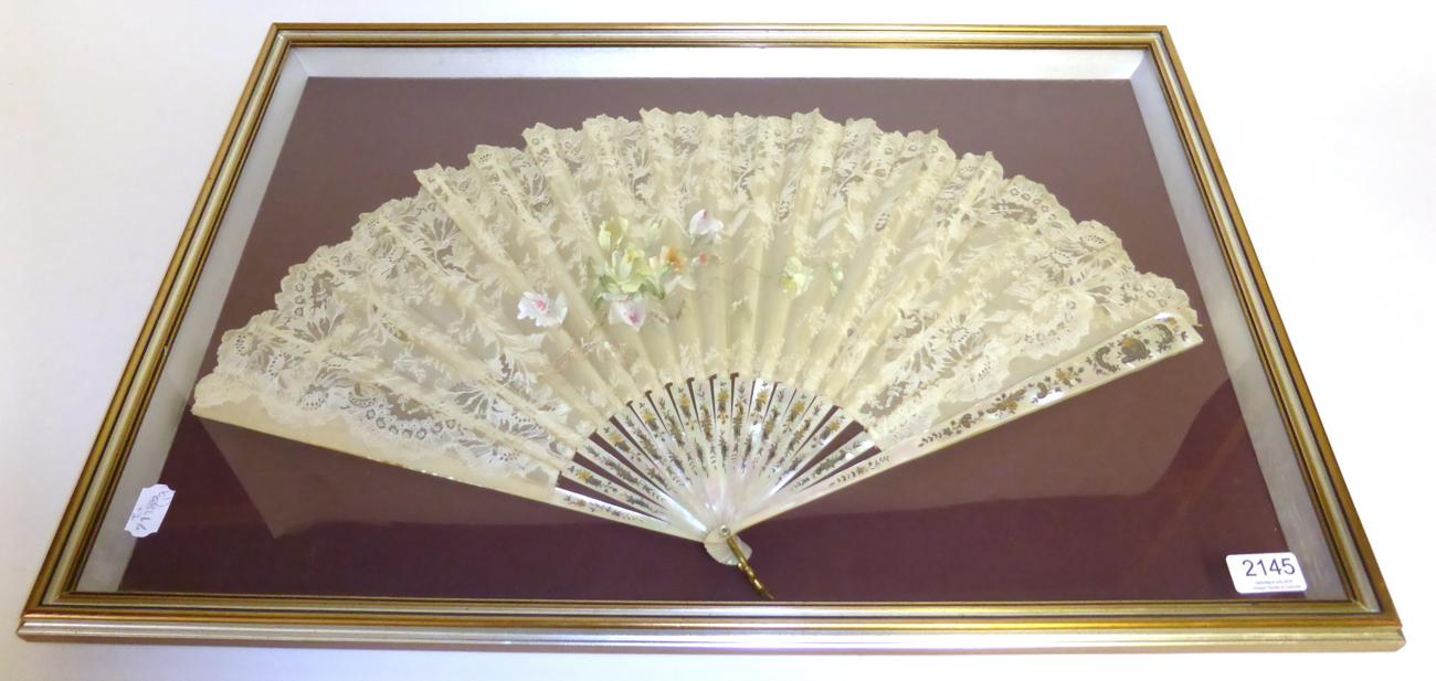 Late 19th Century Mother of Pearl Fan with pierced and painted sticks, with a lace mount hand