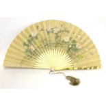 A 19th Century Japanese Shibayama Fan, ivory sticks and guards inlaid with mother of pearl flower