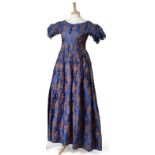 19th Century Blue and Brown Silk Dress woven with floral motifs, with short gathered sleeves, blue