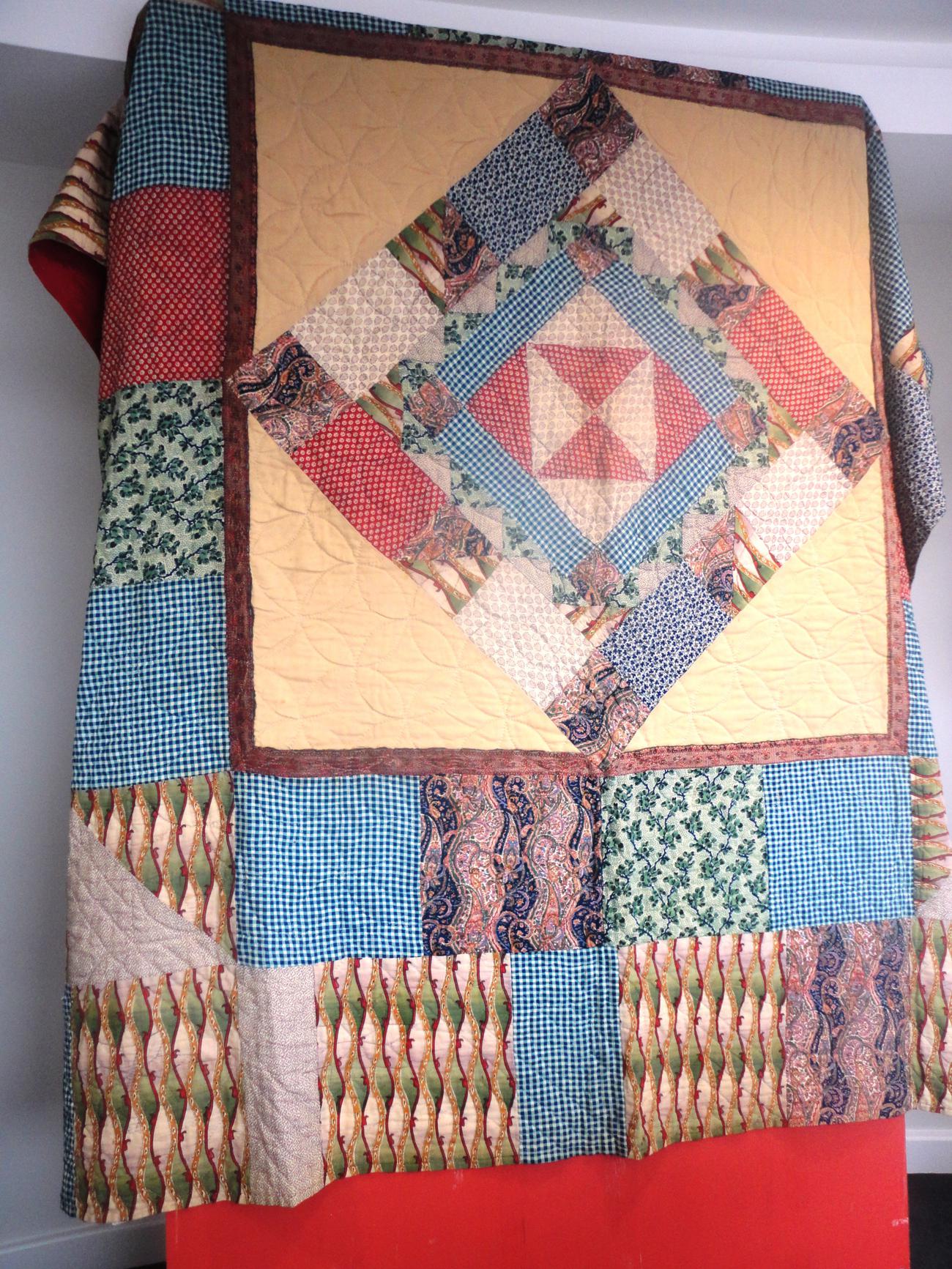 Late 19th Century Patchwork Quilt with central diamond motif and red cotton reverse 230cm by 240cm - Image 2 of 9