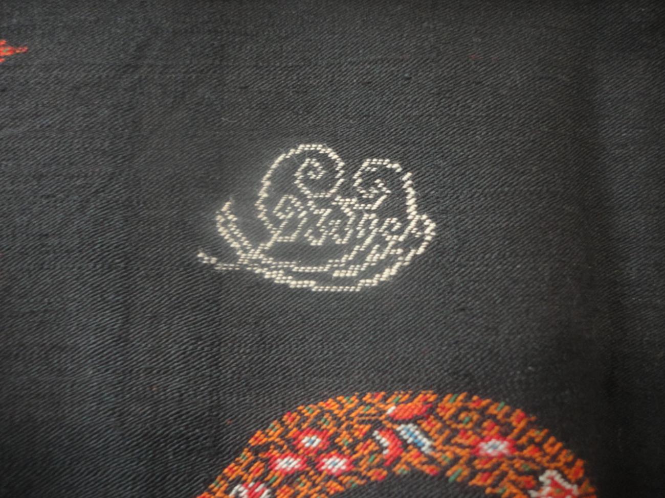 19th Century Red Woven Paisley Shawl, bearing a woven signature in white to the black centre, - Image 2 of 3