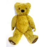 Chad Valley Yellow Plush Jointed Teddy Bear with stitched nose, glass eyes, suede type paw pads,