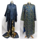 Early 20th Century Japanese Blue Figured Silk Kimono printed to the rolled hem with a warriors