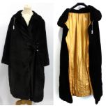 Early 20th Century Black Velvet Evening Cape with yellow silk lining and ruched collar with contrast