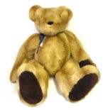 A Very Large Jointed Hartley Bear's Emporium Teddy Bear in light tan plush, dark tan suede paw pads,