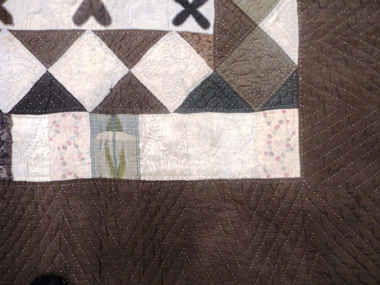 A 19th Century Patchwork 'Wedding' Quilt worked in coloured silks and brocades within a brown and - Image 6 of 7