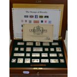 The Stamps of Royalty. A collection of gold plated solid sterling silver stamp replicas, each