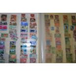 Two Clear Plastic Containers of world stamps in part filled stockbooks. Also a collection of FDC's