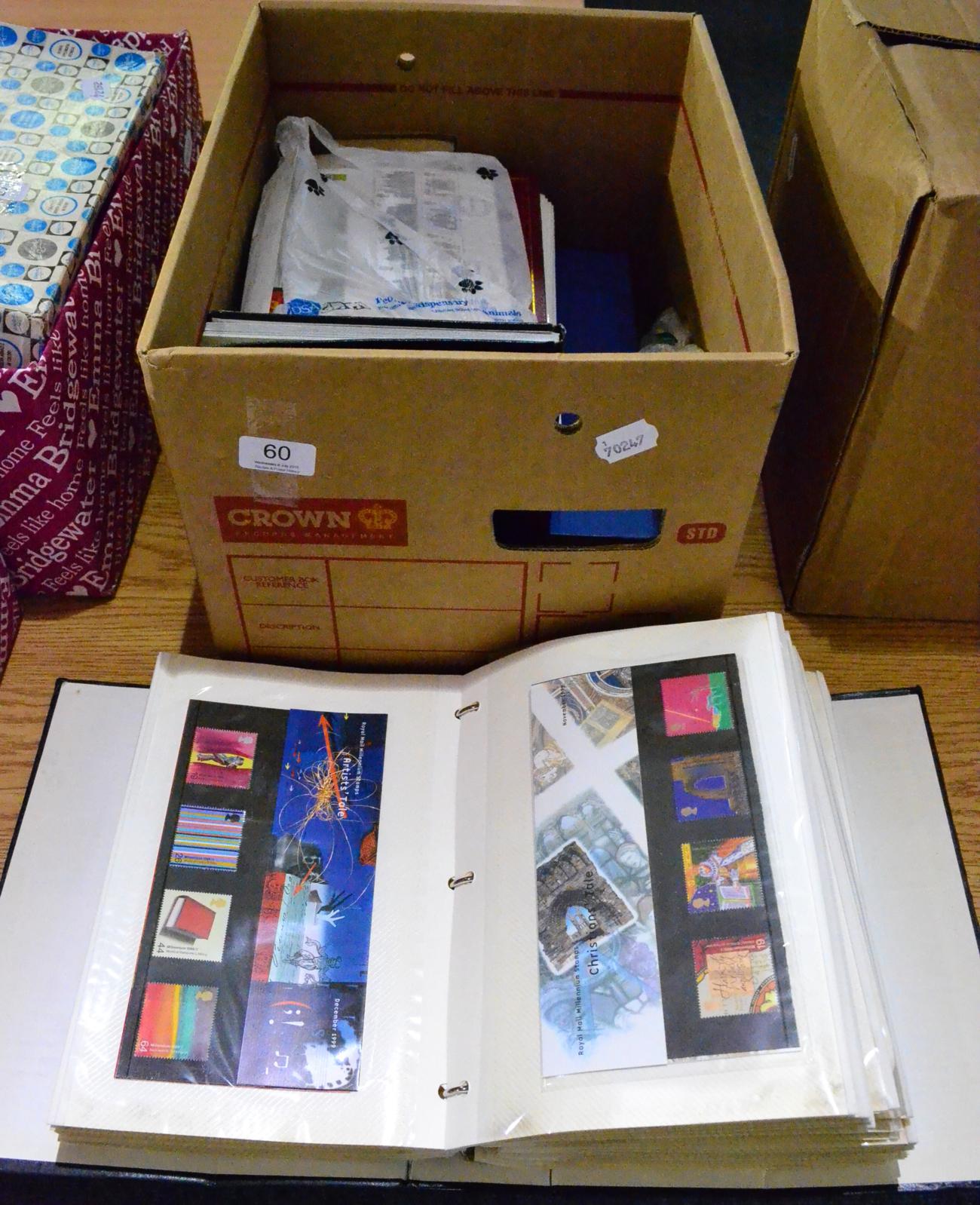 Great Britain Presentation Packs in two albums (majority from the 1990's). Also all world in