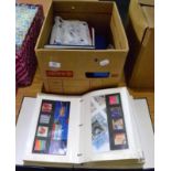 Great Britain Presentation Packs in two albums (majority from the 1990's). Also all world in