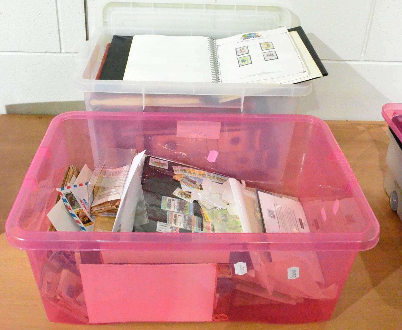 Three Plastic Containers with a collection of St. Nevis and Kitts. Leaders of the World in two