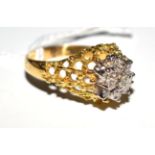 An 18ct gold diamond cluster ring, total estimated diamond weight 0.66 carat approximately