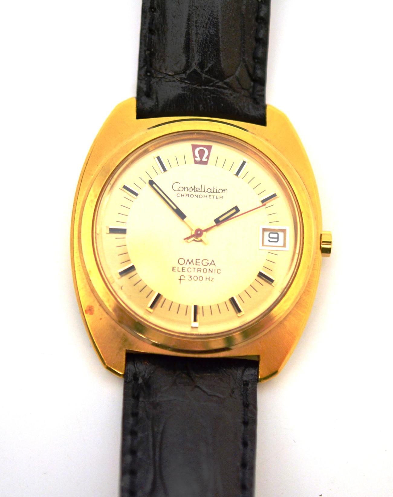 A steel and gold plated electronic centre seconds calendar wristwatch, signed Omega, model: