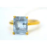 An 18ct gold aquamarine solitaire ring