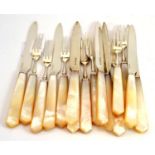 A set of eight silver and mother-of-pearl fruit knives and forks, Charles James Allen, Sheffield