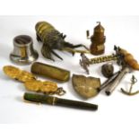 Novelty tape measure, gilt belt buckles, Parker pen, brass crayfish paperweight, etc