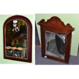 Victorian reverse engraved arched mirror with unusual pocket and a Victorian mahogany framed mirror