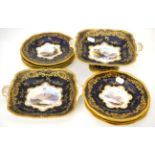 Coalport topographical part dessert service; eight plates, comport (a.f.) and a serving plate