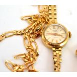 A lady's 9ct gold wristwatch and a necklace stamped 375