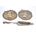 Two silver dishes and a cake knife