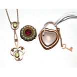 A peridot and seed pearl drop necklace, a foil backed garnet and pearl cluster and a heart shaped