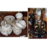 A tray including elephant bookends, pair of barley twist candlesticks, crackle glaze vase, a