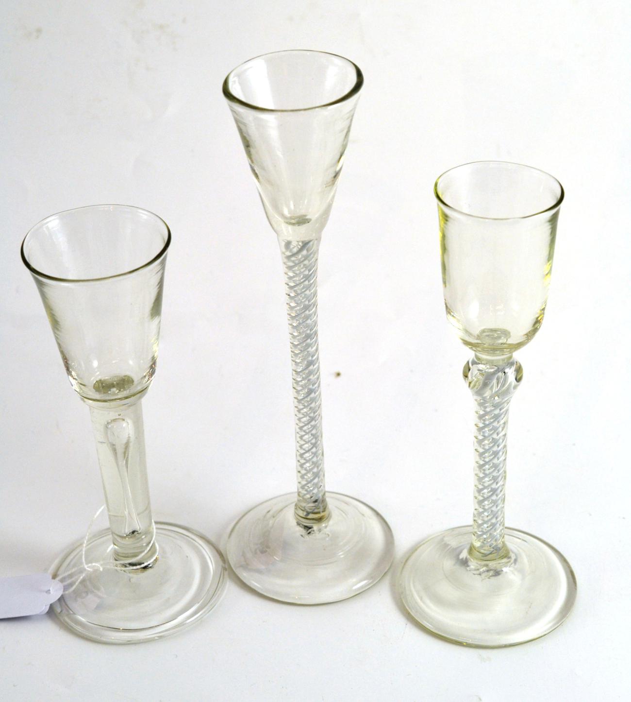 Two spiral twist wine glasses and an 18th century style wine glass (3)