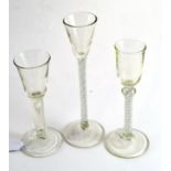 Two spiral twist wine glasses and an 18th century style wine glass (3)